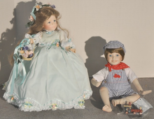 Appraisal: Two Collectible DollsIncluding porcelain Andy by Maryanne Oldenburg and Alison