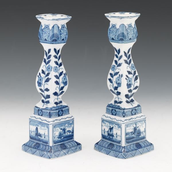 Appraisal: DELFT CANDLESTICKS x x Pair of Dutch blue and white