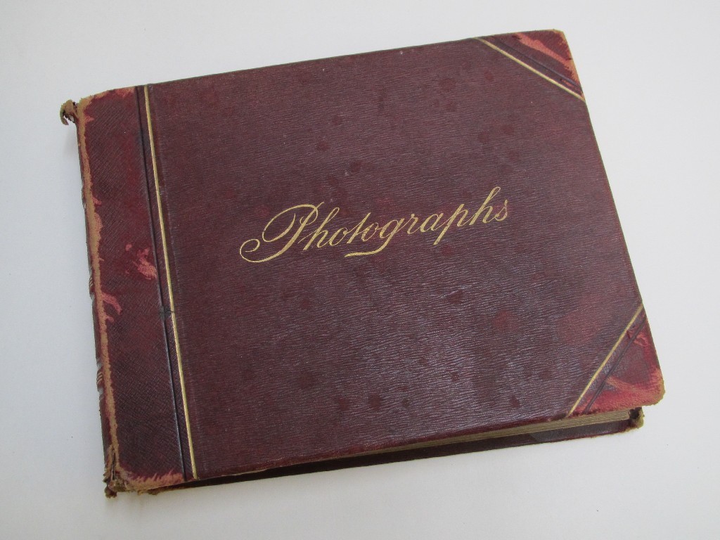 Appraisal: A Victorian photograph album comprising Scottish Country houses and guests