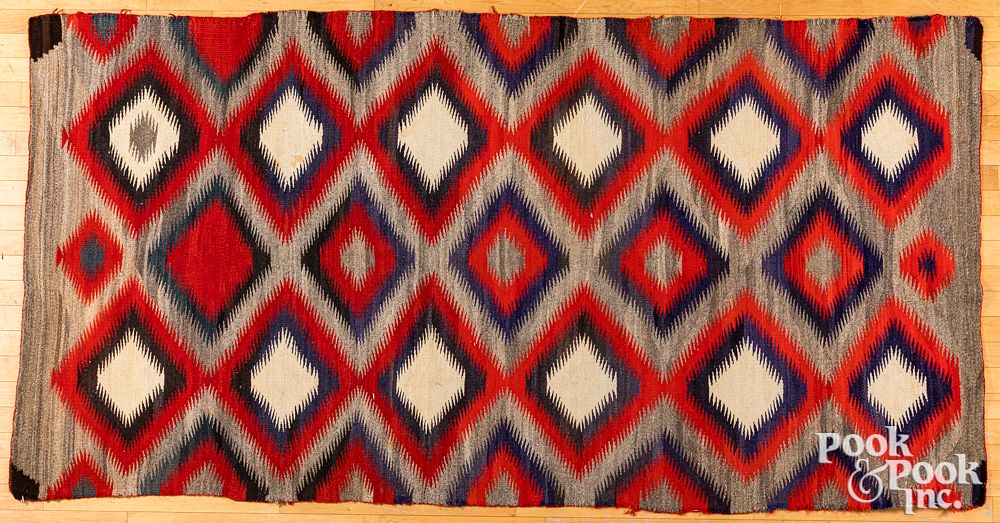 Appraisal: Navajo Indian rug Navajo Indian rug with vibrant dazzler motif