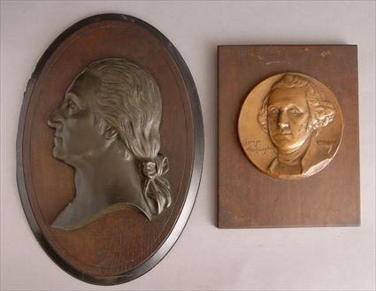 Appraisal: TWO METAL RELIEF HEADS OF GEORGE WASHINGTON The one a