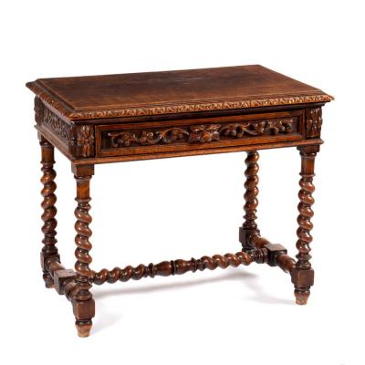 Appraisal: An oak side table the moulded top above a frieze