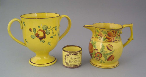 Appraisal: Canary loving cup th c h together with a creamer