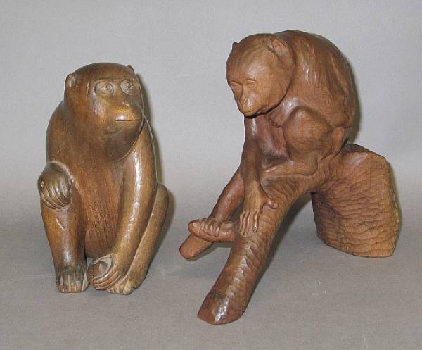 Appraisal: Two wood carvings of monkeys The first realistically carved as