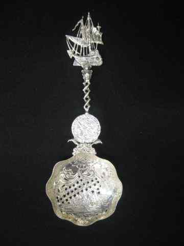 Appraisal: Dutch Sterling Silver Nut Spoon figural sailing ship medallion han