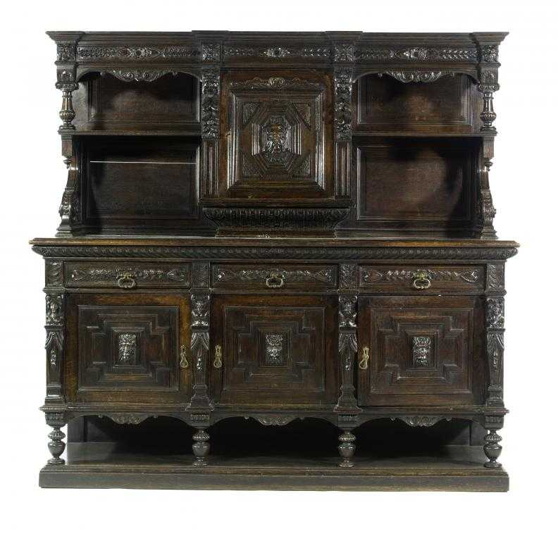 Appraisal: A VICTORIAN CARVED OAK SIDEBOARD the breakfront superstructure with stepped