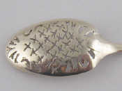 Appraisal: A silver mote spoon with cross piercing to bowl maker's