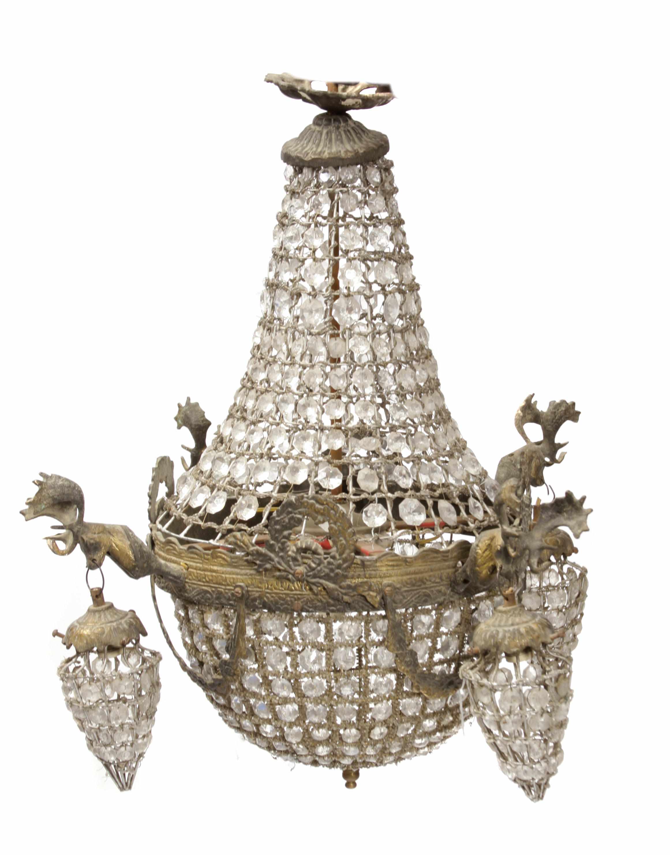 Appraisal: A pair of bronze and glass four light chandeliers Of