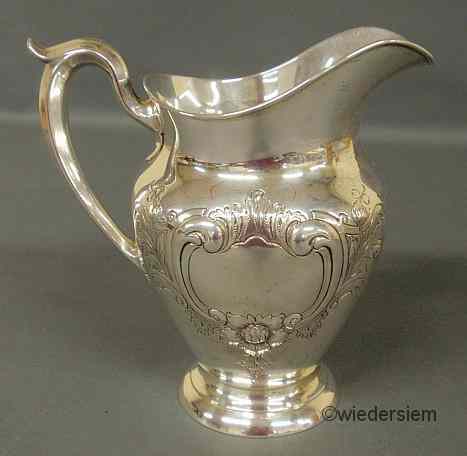 Appraisal: Sterling silver water pitcher by Gorham with hand-chased floral decoration