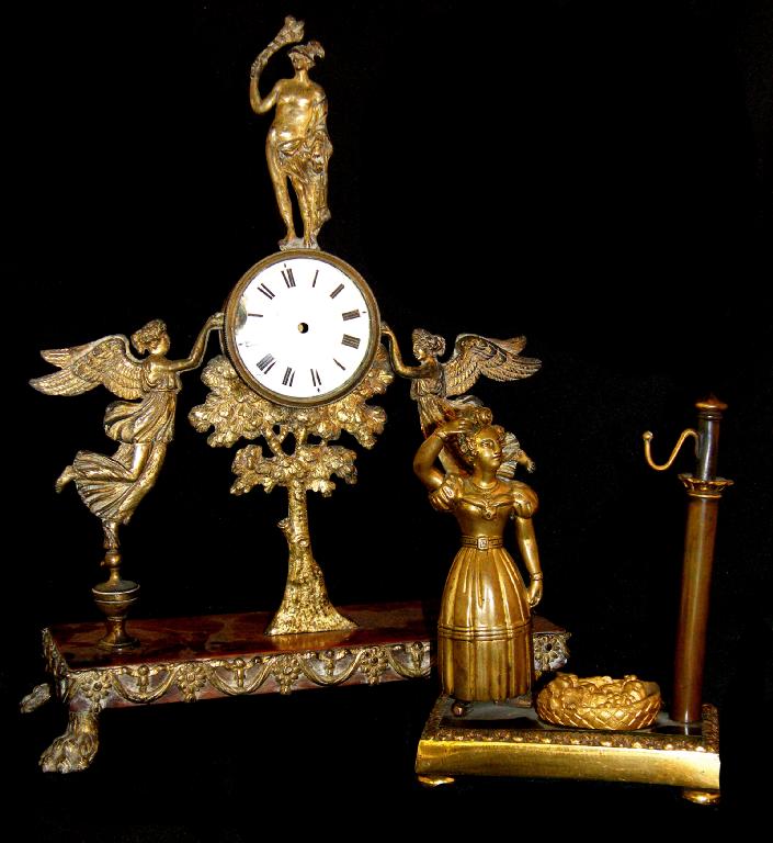 Appraisal: th century gilded spelter and walnut watch stand the drumhead