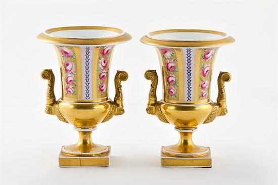 Appraisal: Pair Paris porcelain campana urns th century gilt body adorned