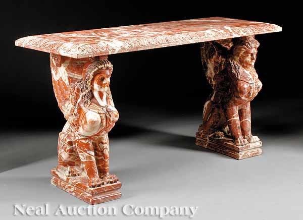 Appraisal: An Italian Rouge Marble Console Table the top with acanthus