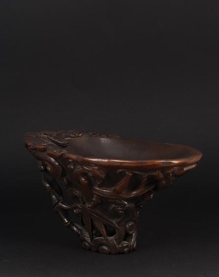 Appraisal: A FINE CHINESE RHINOCEROS HORN LIBATION CUP carved with lingzhi