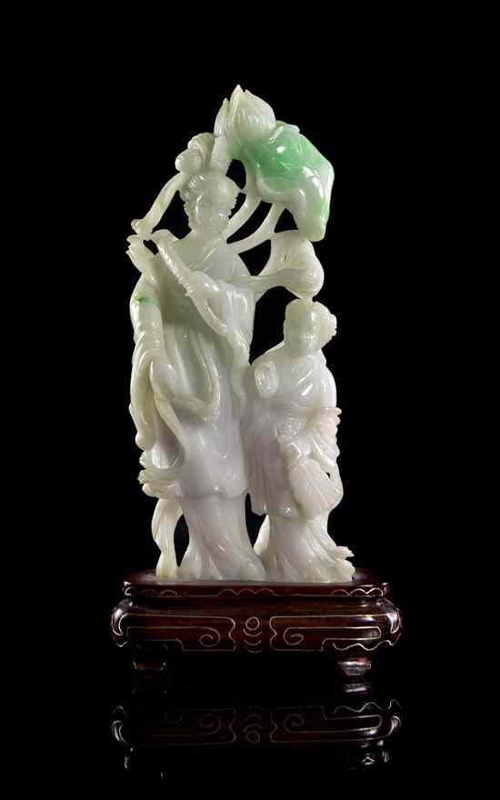 Appraisal: A Chinese White Jadeite Carving of white and apple green