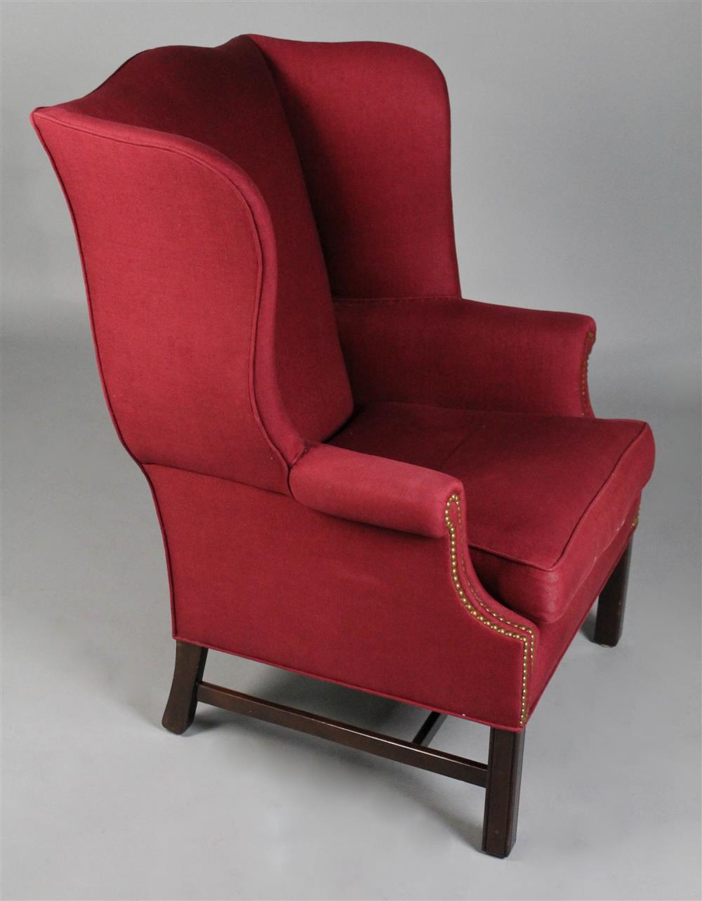 Appraisal: CLARET COLORED LINEN TEXTURED UPHOLSTERED CHAIR AND TWO COORDINATING CUSHIONS