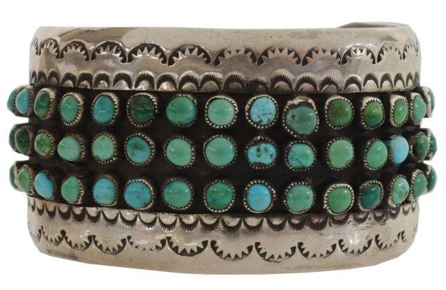 Appraisal: Native American silver content unknown cuff bracelet with turquoise cabochons