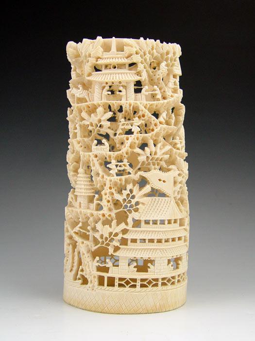 Appraisal: CHINESE CARVED IVORY TUSK VILLAGE Carved and openwork with figures