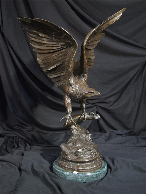 Appraisal: BRONZE EAGLE After Jules Moigniez the eagle with outstretched wings