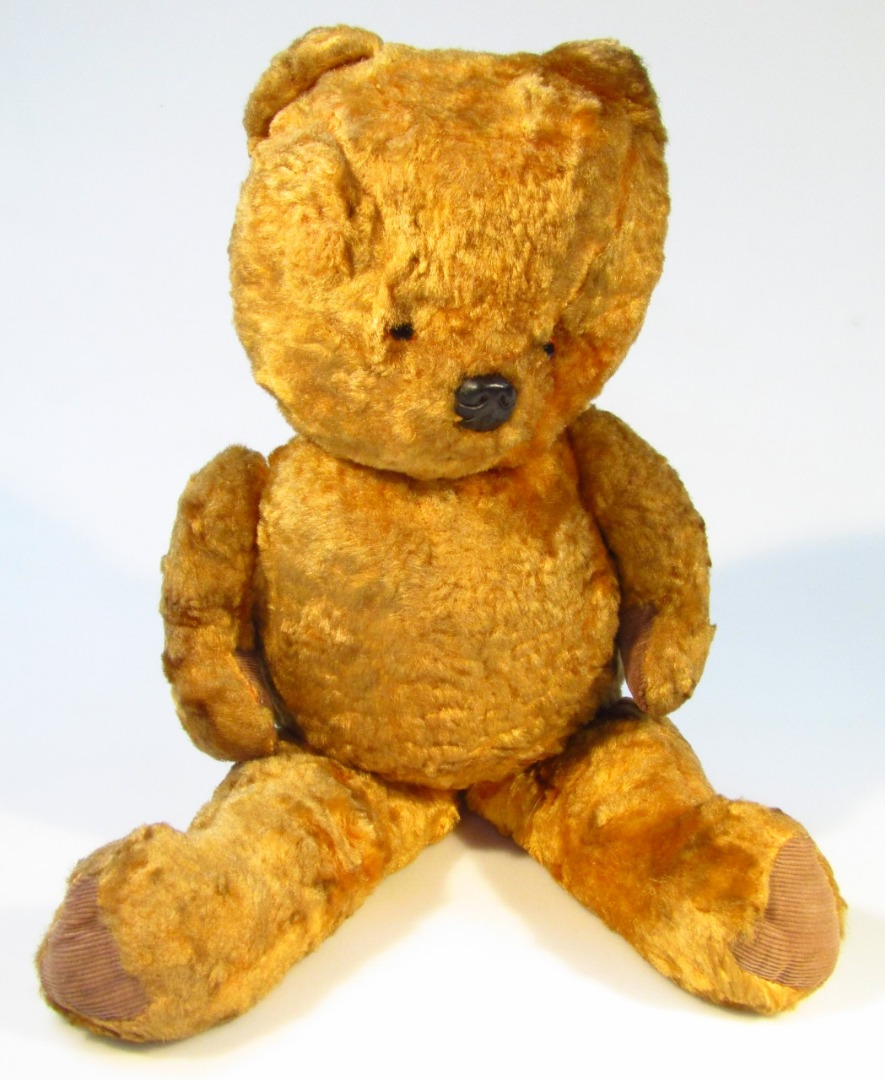 Appraisal: An early thC blonde plush jointed Teddy bear with shaped