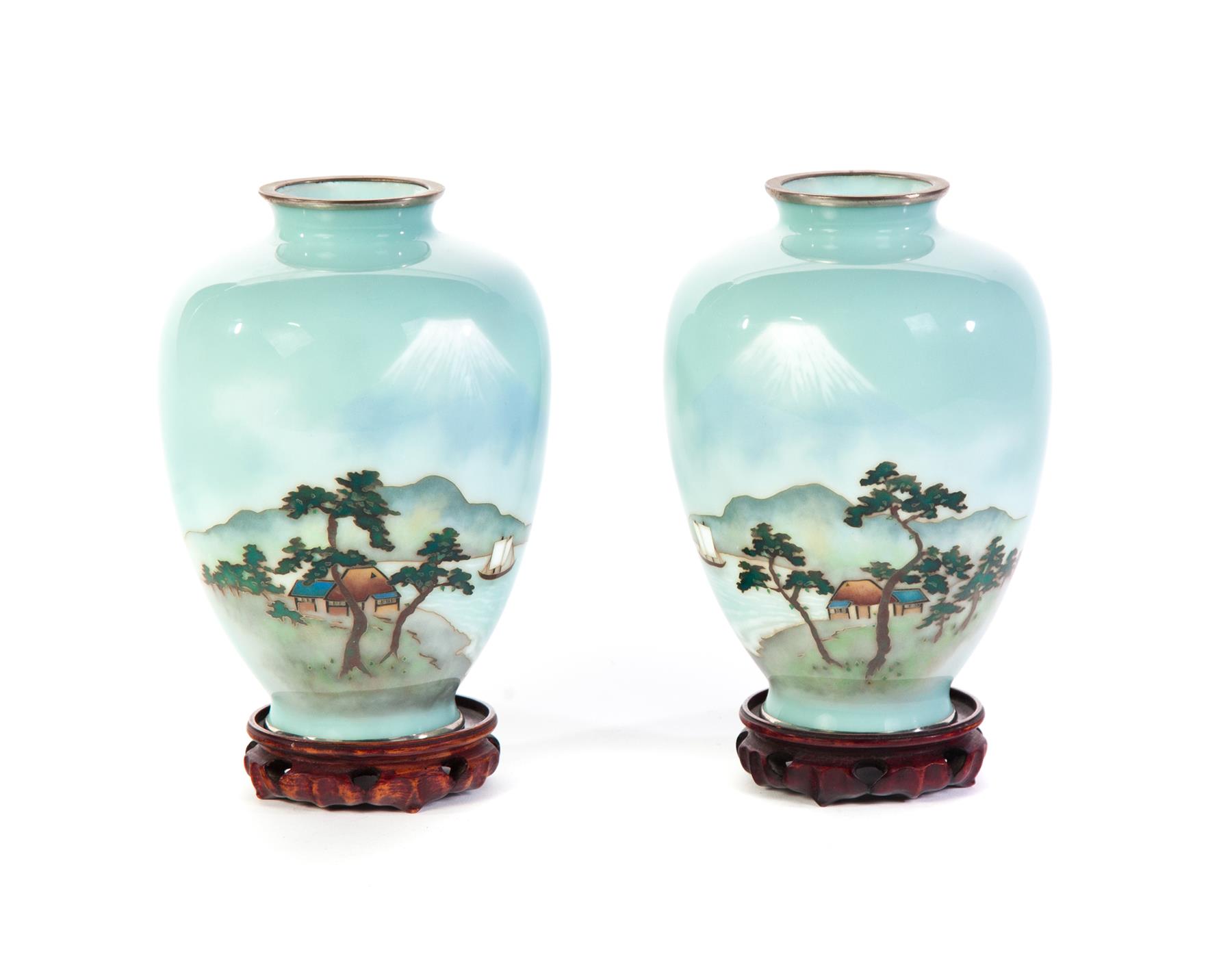 Appraisal: PAIR OF JAPANESE CLOISONNE VASES Mid th century Scenic views