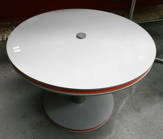 Appraisal: A brushed aluminium and orange melamine circular side table cm