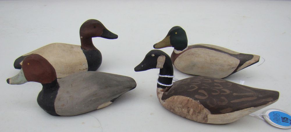 Appraisal: FOUR MINIATURE BIRD CARVINGS By D MacKenzie Canada goose canvasback