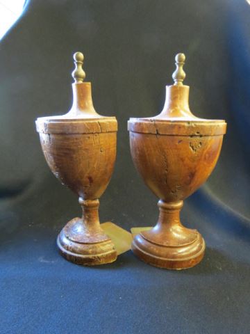 Appraisal: Carved Wooden Bookends urn form