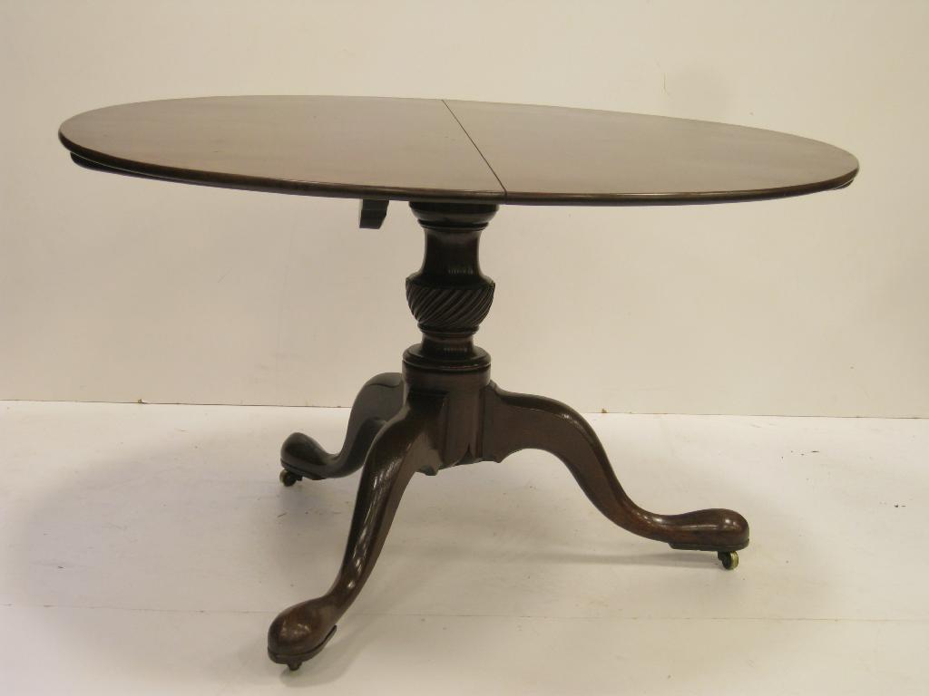 Appraisal: A late Georgian mahogany Centre Table the circular top above