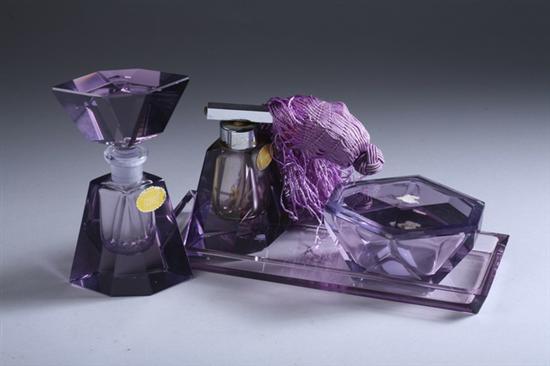 Appraisal: FOUR-PIECE POSSEIL KRISTALL VANITY SET Circa Purple hand-cut crystal set