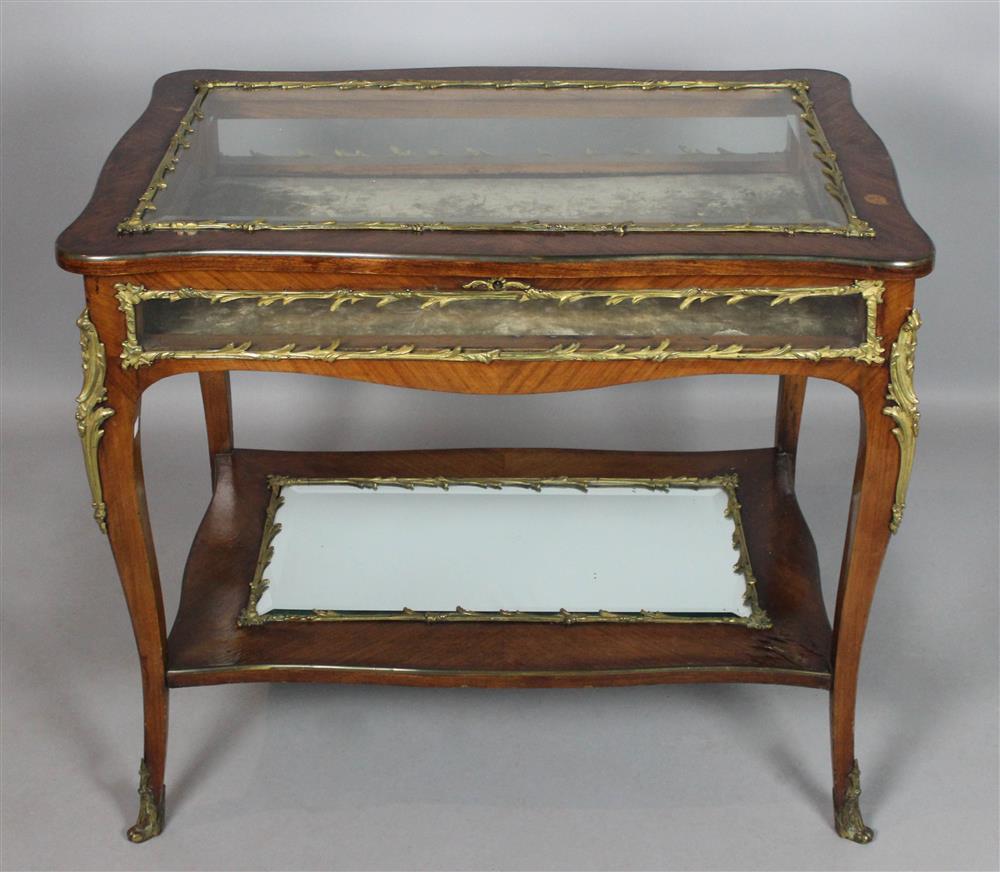 Appraisal: LOUIS XV STYLE GILT MOUNTED VITRINE TABLE the vitrine with