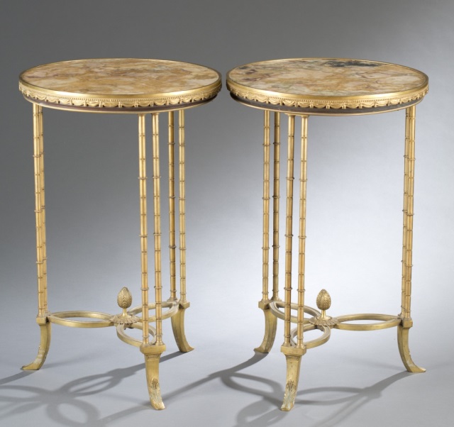 Appraisal: Yellow marble cast metal with gilt and ormolu Marble rests