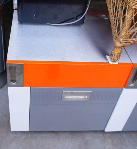 Appraisal: A pair of stainless steel orange and grey laminate filing