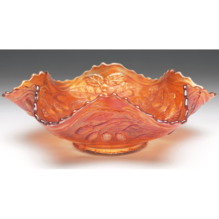 Appraisal: Carnival Glass bowl pressed peacock design orange iridescent glass unmarked