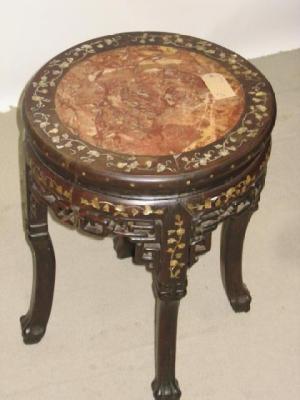 Appraisal: AN ORIENTAL PADOUK WOOD JARDINIERE STAND of circular form and