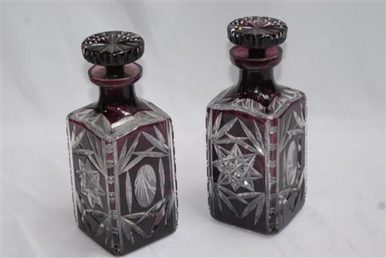 Appraisal: PAIR DECANTERS Amethyst cut crystal with stopper H each