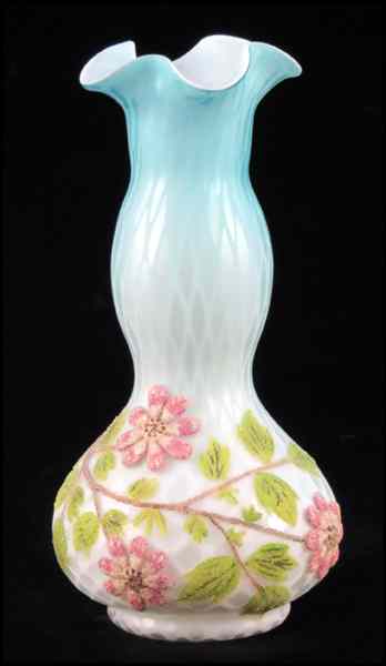 Appraisal: QUILTED SATIN GLASS VASE Bearing applied glass bead floral decoration