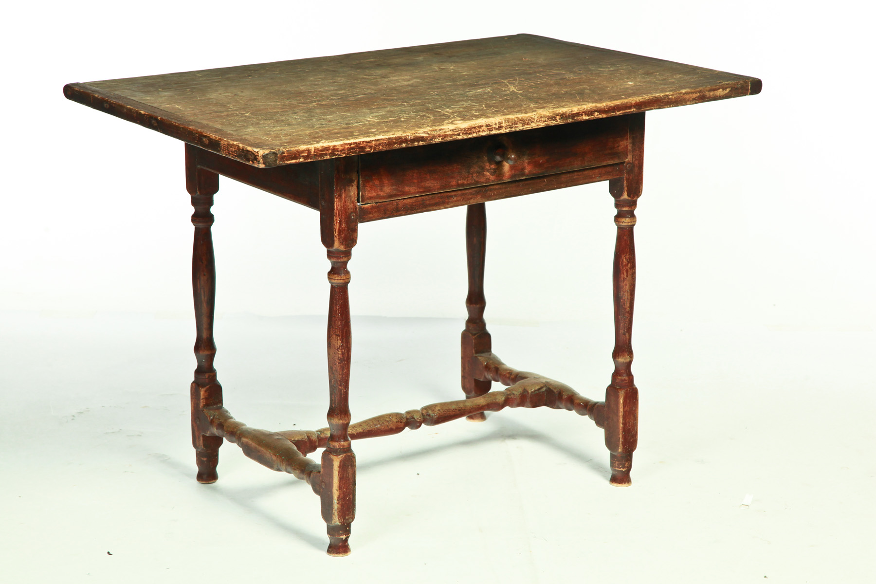 Appraisal: AMERICAN TAVERN TABLE Early th century yellow pine Scrubbed breadboard