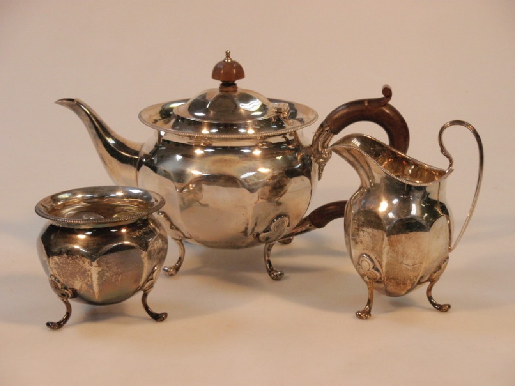 Appraisal: A George V silver three piece tea service by Edward