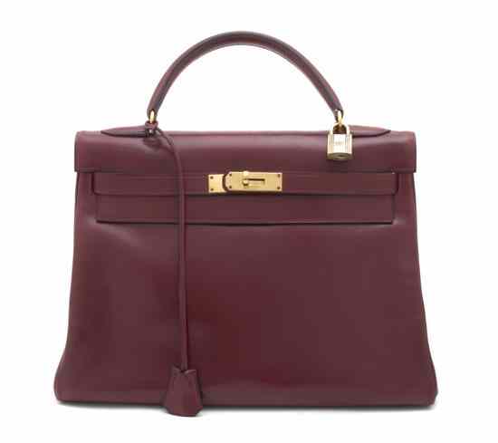 Appraisal: An Hermes Kelly Soft Red Calf Bag with lock and