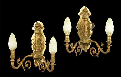 Appraisal: A set of four Edwardian gilt metal wall lights with