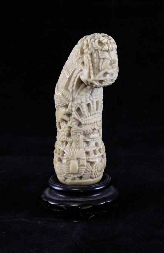 Appraisal: A South Asian ivory handle th century carved in relief