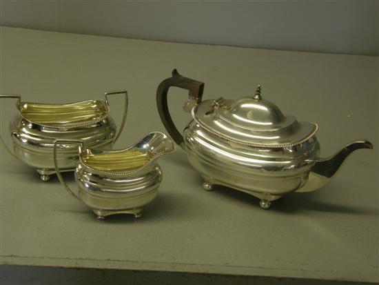 Appraisal: George V matched silver three piece tea service comprising tea