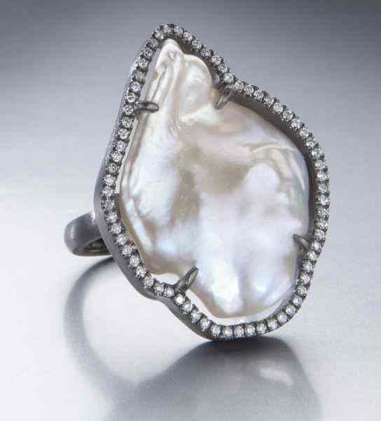 Appraisal: Sterling silver diamond and pearl ring Stamped '' SR'' grams