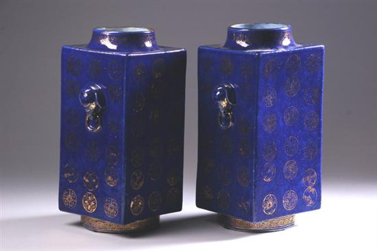 Appraisal: PAIR CHINESE GILT AND BLUE PORCELAIN CONG-FORM VASES Guangxu six-character