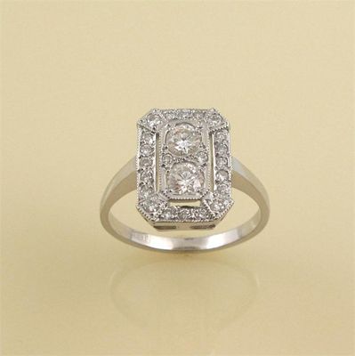 Appraisal: A diamond dress ring the rectangular plaque is set with