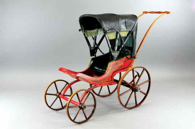 Appraisal: CHILD'S BABY CARRIAGE Painted wood and canopy folding top wooden