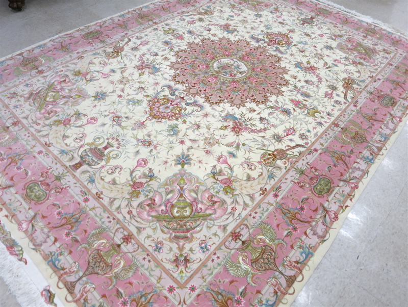 Appraisal: A CONTEMPORARY PERSIAN WOOL AND SILK CARPET hand knotted in