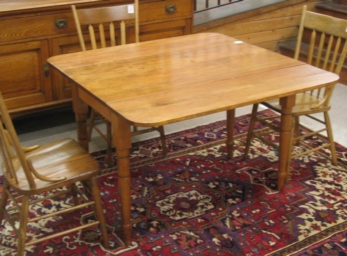 Appraisal: COUNTRY PINE DROP-LEAF DINING TABLE AND THREE CHAIRS American th