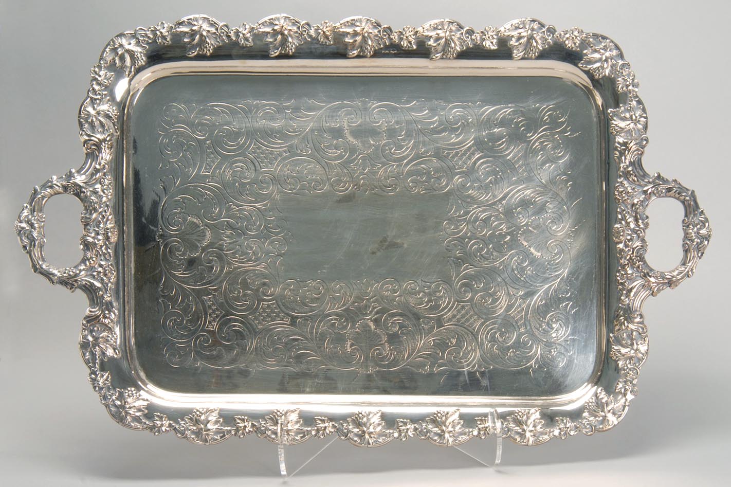 Appraisal: SILVER PLATED WAITER in rectangular form with foliate design and