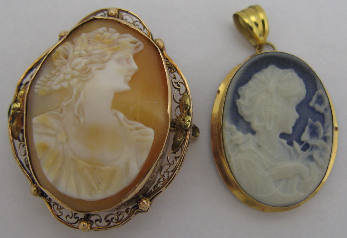 Appraisal: TWO VICTORIAN CAMEO PENDANTS each with silhouettes of beautiful women